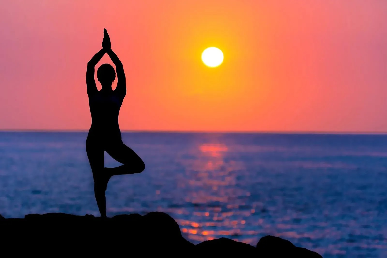 woman doing yoga at sunset%25281%2529 result