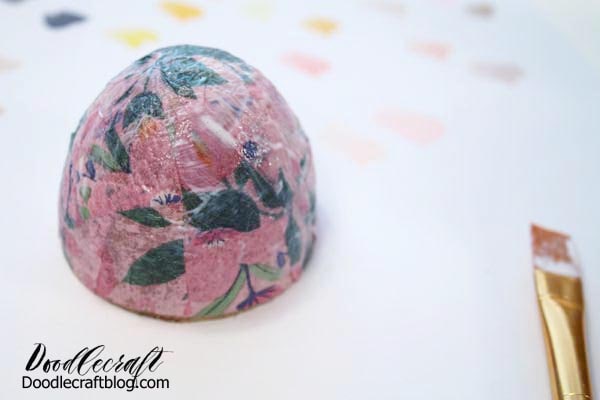 Easter eggs covered in Mod Podge and napkin pieces for the perfect egg painting fun