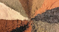 A colorful array of different types of soil. A colorful array of different types of soil.