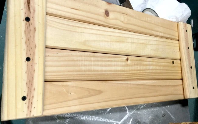 Wooden pieces screwed together to make a tray