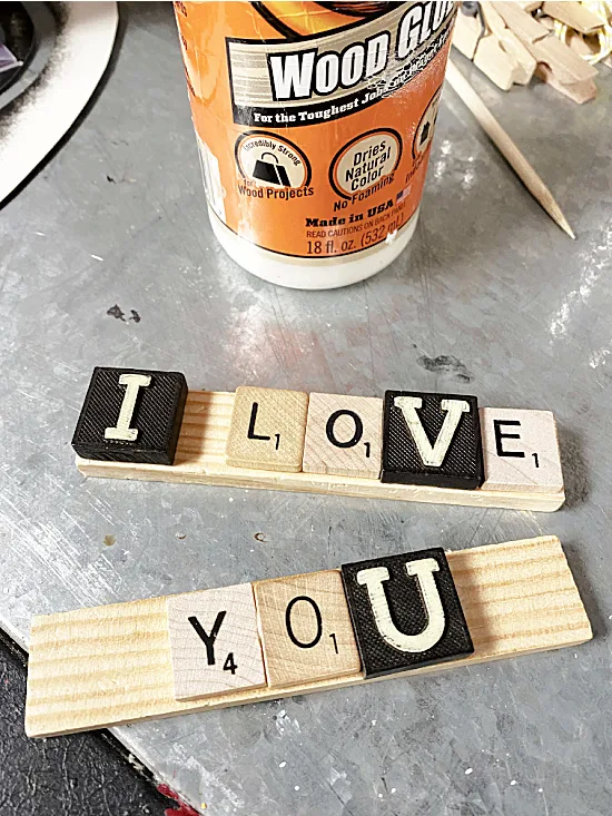 glue bottle and I LOVE YOU Scrabble words