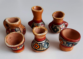 Six peruvian miniature pots.