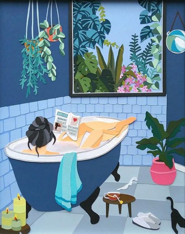 paper cut scene of a young woman reading in the bath