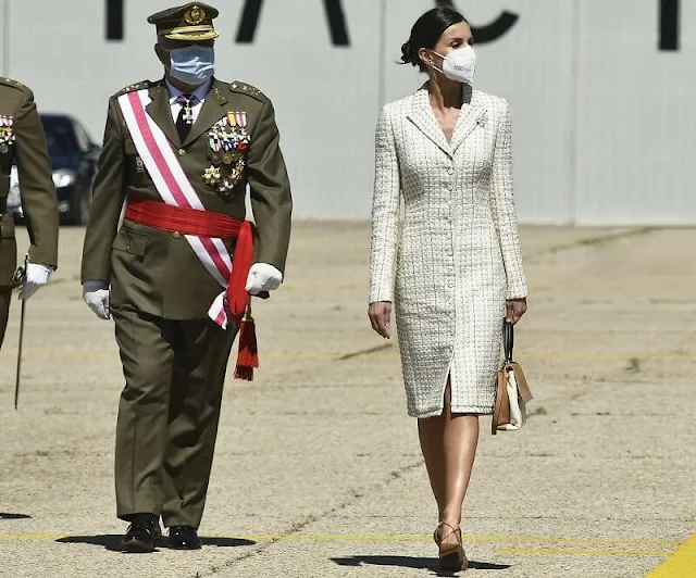 Queen Letizia wore a dress by Felipe Varela for baptism ceremony of Princess Leonor. Carolina Herrera authentic handbag