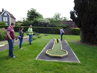 Surrey Invitational Tournament champion Oliver 'The Machine' Florence playing the Stoke Park loop-di-loop hole. Strangely, the loop is turfed on the outside!