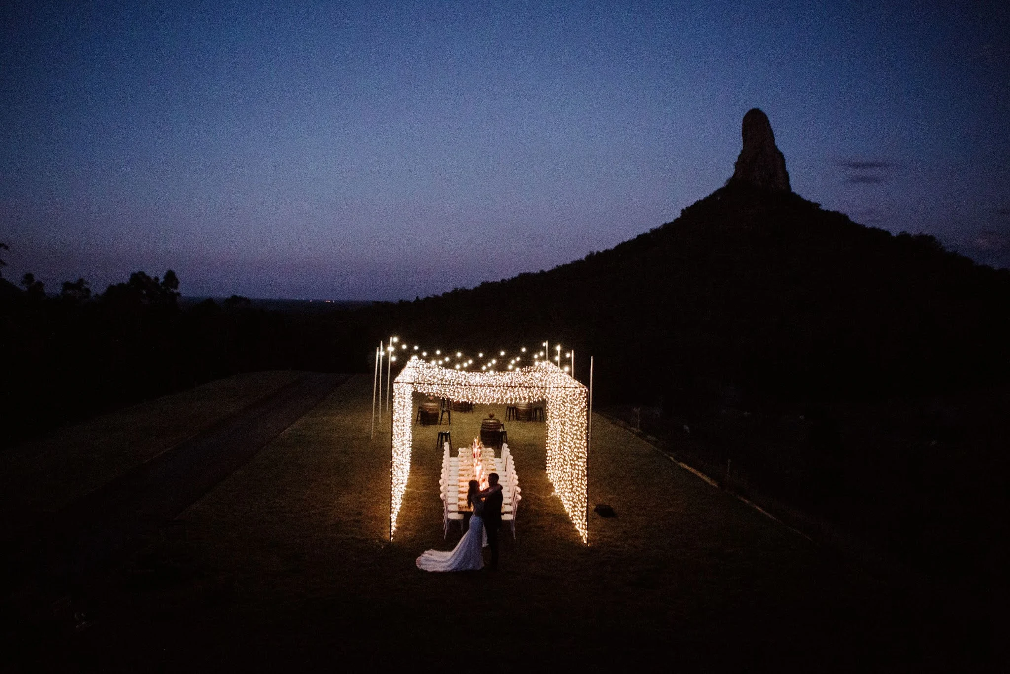 Kayla Temple Photography festoon lighting bridal gowns tablestyling