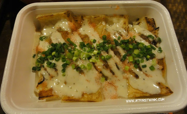 Flat gyoza with melted cheese from Gyoza stadium in Sunshine City, Ikebukuro