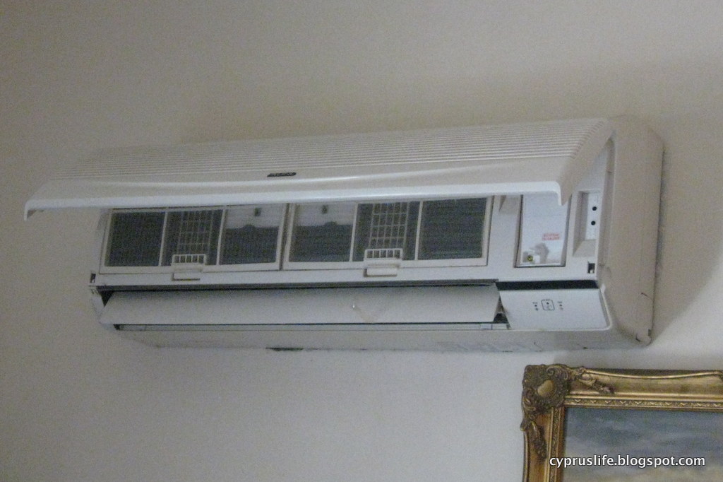 This is Cyprus... Cleaning our air conditioning units (in Cyprus)