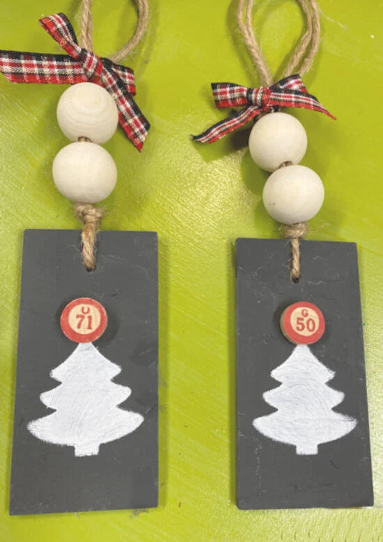 Two stenciled tree ornaments