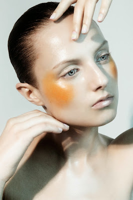 woman with orange blush, shiny skin, nyc beauty photography