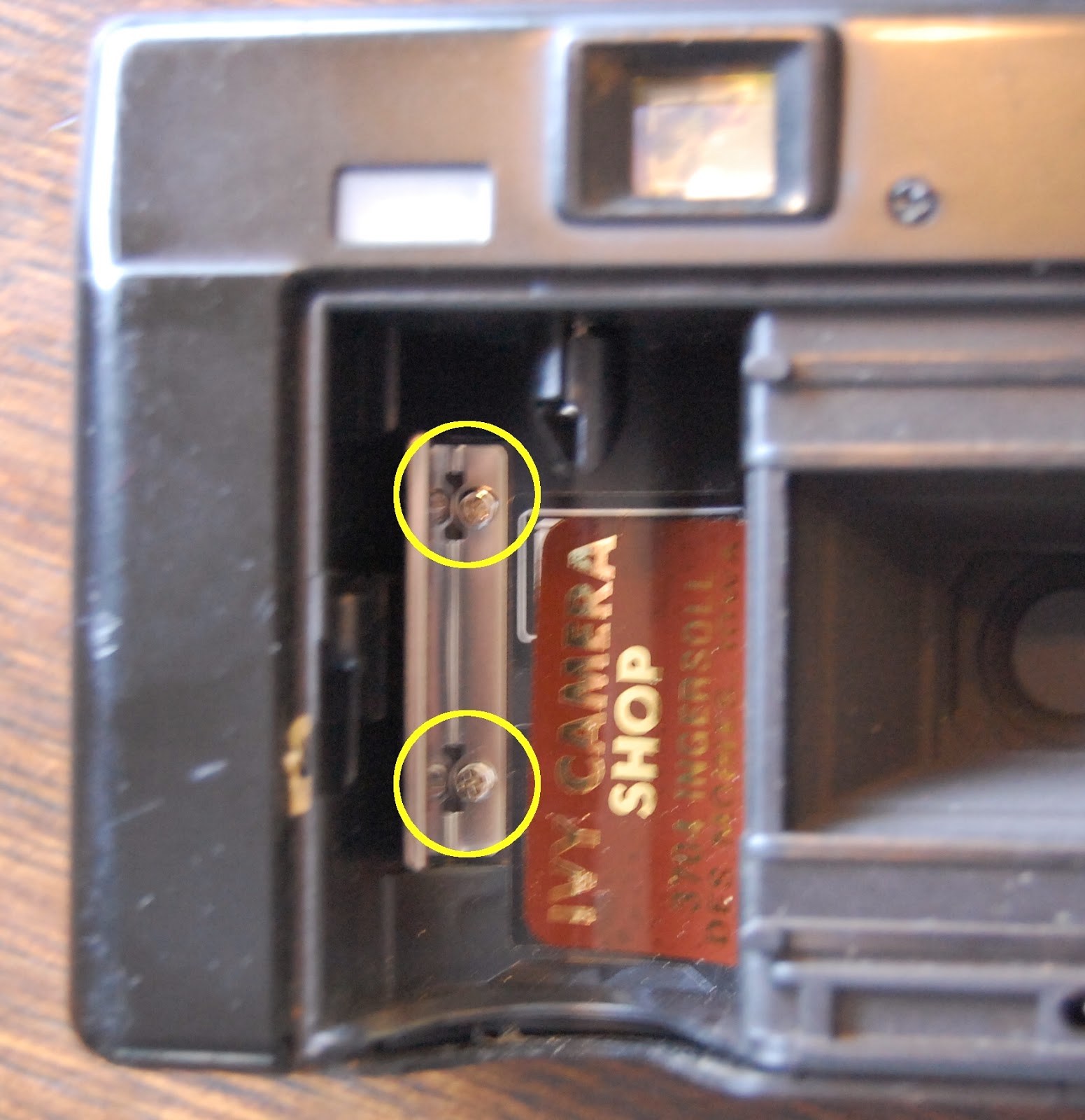 How to open a Nikon L35AF in this case, for a shutter release and on