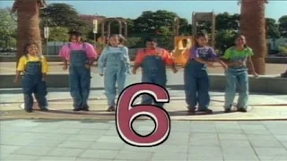six children who dance on a playground to the same beat. Sesame Street Let's Make Music