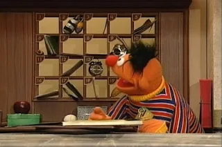 Ernie puts the the key for room number seven in the mailbox for room number seven. Sesame Street 123 Count with Me