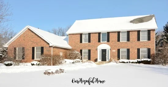 brick colonial house garage shutters snow Home Alone movie