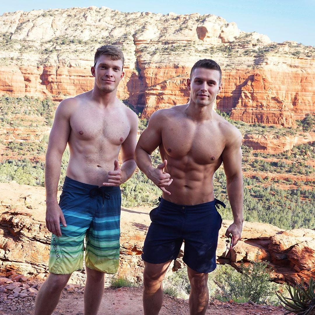 two-handsome-shirtless-fit-bros-mountain-adventure
