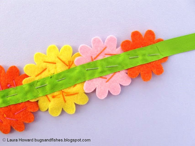 Felt Flower Crown Sewing Tutorial: pin then sew the flowers to a length of ribbon