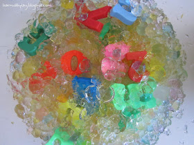 crushed water beads, letter activity