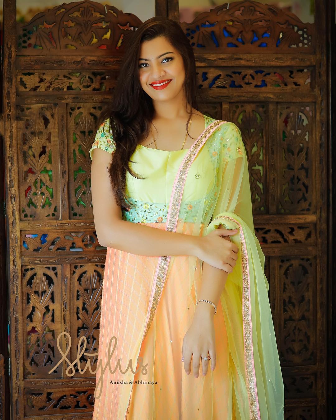 Indian Singer Geetha Madhuri Long Hair In Orange Gown Tollywood