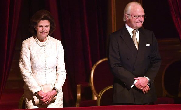 King Carl Gustaf and Queen Silvia watched a performance of the classic opera Rigoletto at the Royal Swedish Opera. pearls necklace