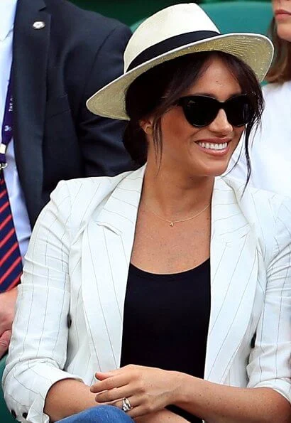 Meghan Markle wore L'Agence Brea pinstriped-linen and cotton blend blazer. The Duchess of Sussex and Serena Williams