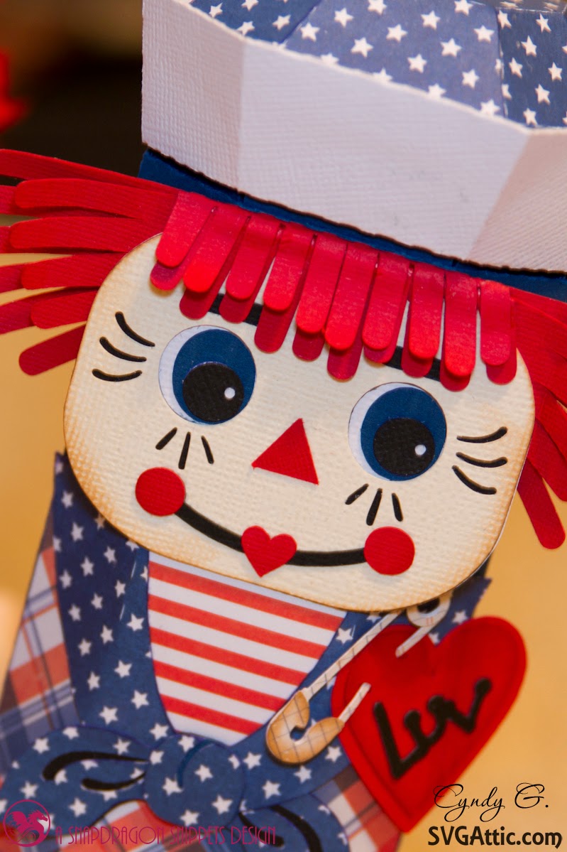 close up of Raggedy Andy's face and pinned on heart