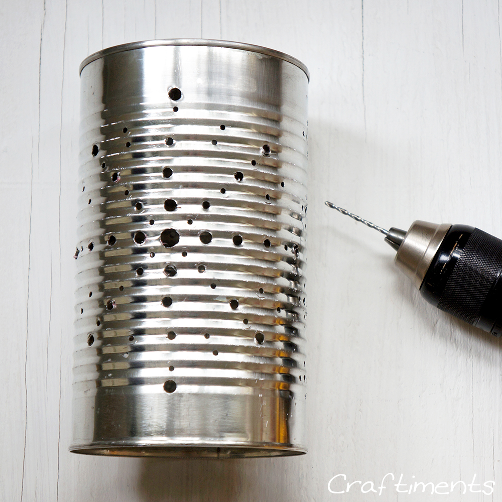 Drill holes in can with power drill.