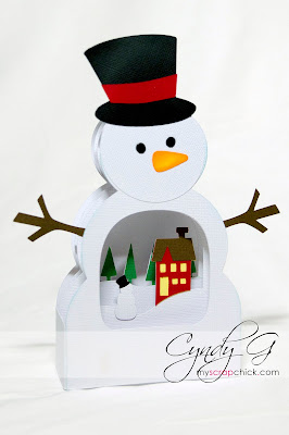 3d card shaped like a snowman with a wintry scene inside