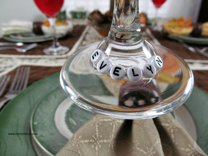 The Easy Wine Glass Charms you need to make now. Easy personalized wine glasses.