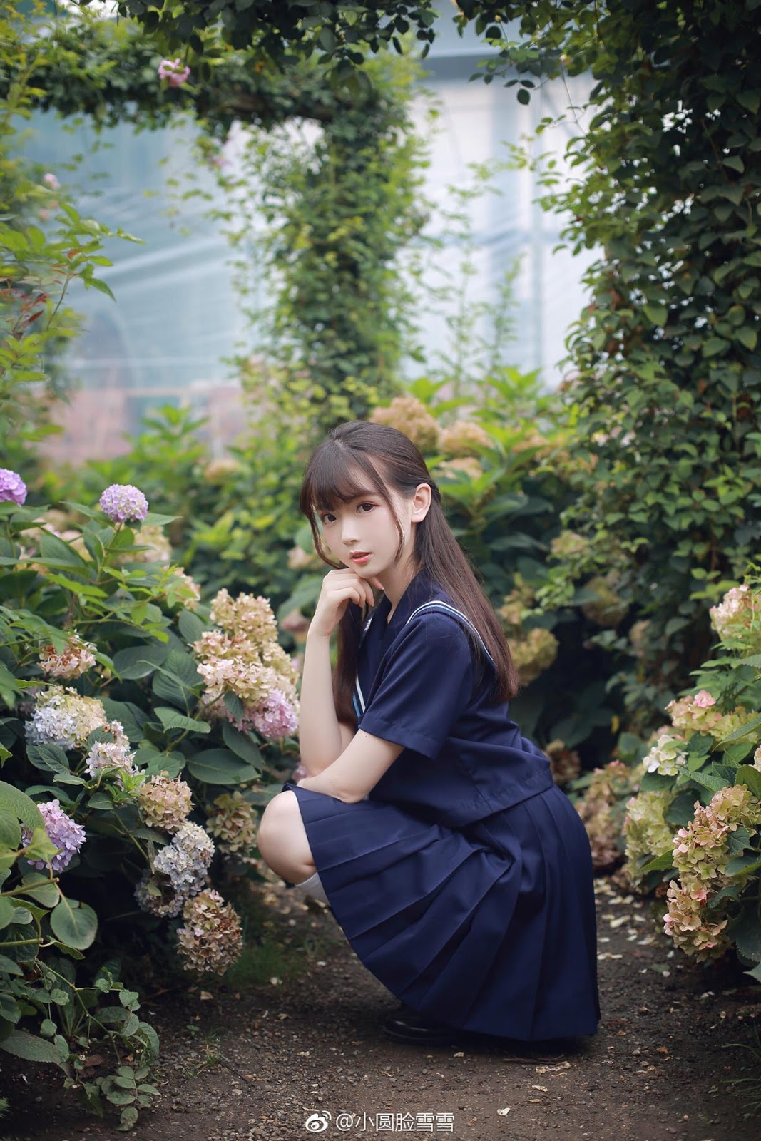 Chinese cute model - Little girl in the flower garden