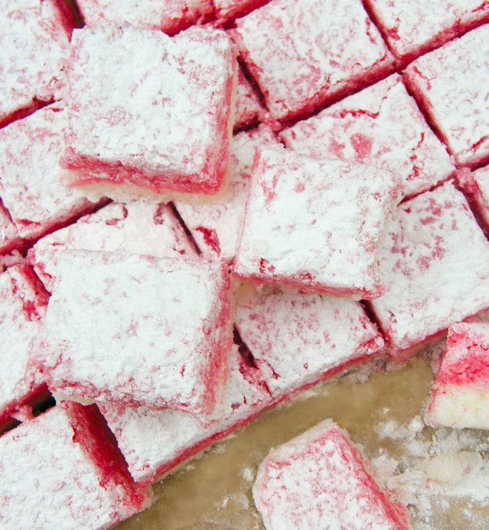 squares of coconut ice on baking paper