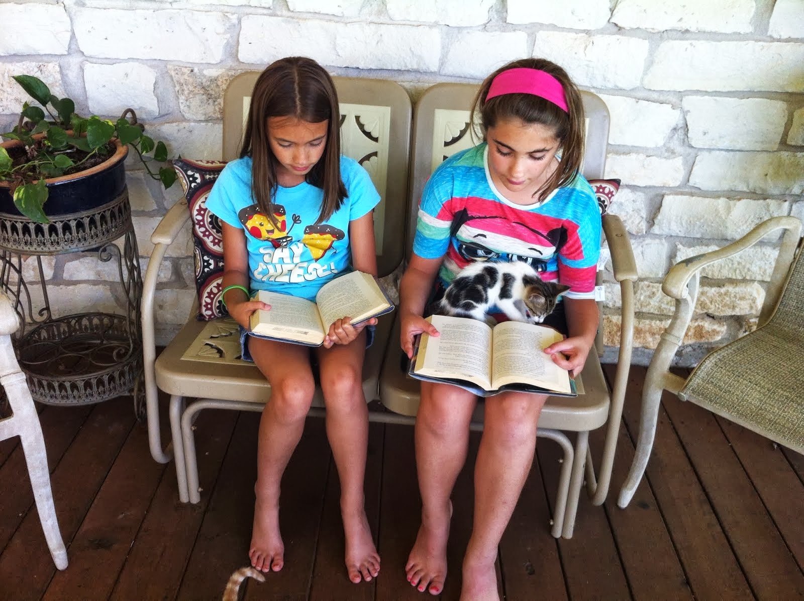 Smithville Elementary Library: Amanda and Vivian are reading barefoot!