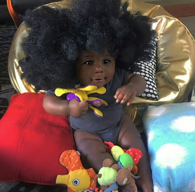  Young African mom celebrates her cute son with the most beautiful black skin