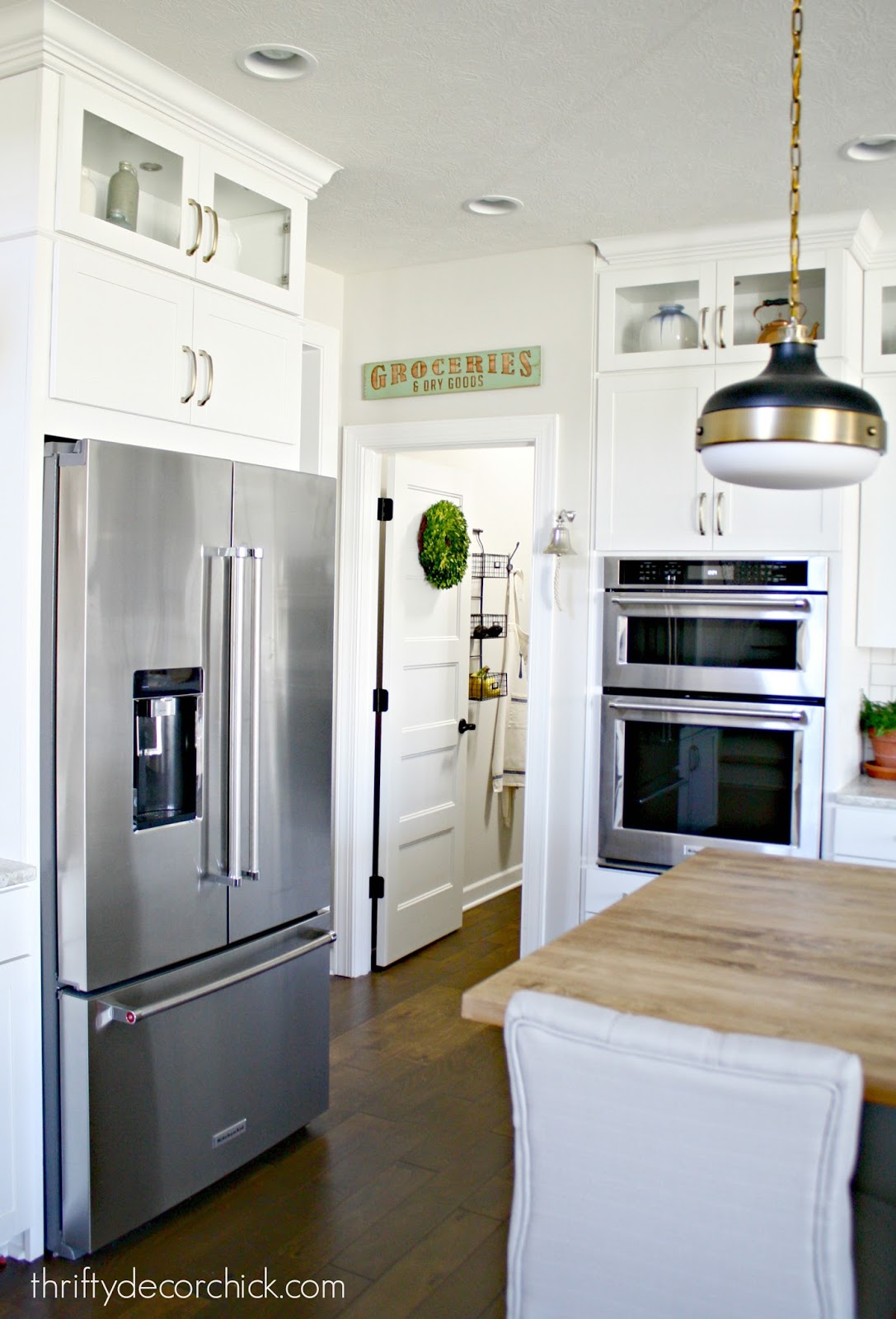 white kitchen with wood accents