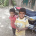 Children begging outside a Masjid at Batengoo, Anantnag.