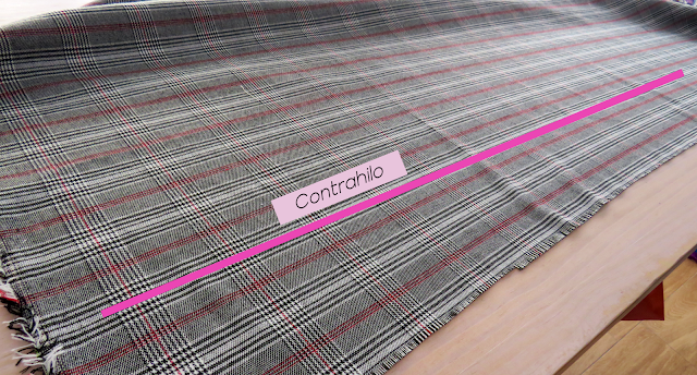 Tejido extendido señalando el contrahilo