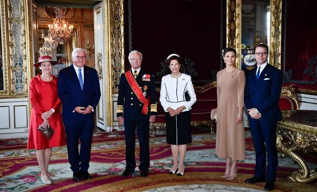 Elke Büdenbender, Queen Silvia, Prince Carl Philip, Princess Sofia. Crown Princess Victoria wore a blazer by Andiata