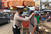 Tekan Covid-19, 5000 Masker di Bagikan Satgas Polda Banten-TNI dan Satpol PP
