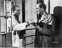 Telly Savalas and Burt Lancaster in Birdman of Alcatraz