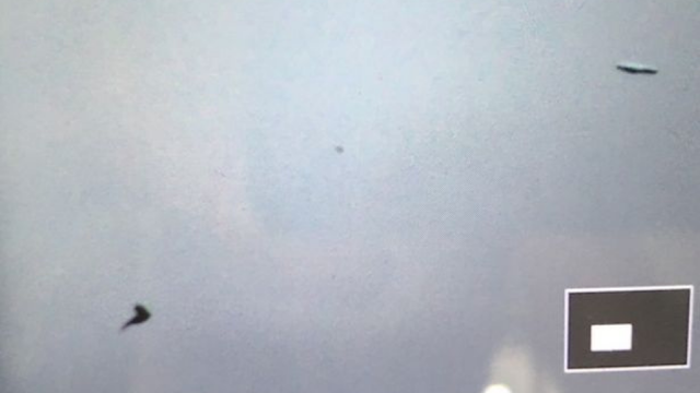 Photos of the two UFOs flying over Chelmsford in the UK.