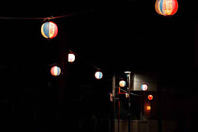 Orion Beer, paper lanterns,night street scene