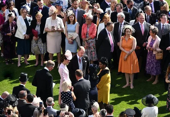 Kate Middleton wore a bespoke soft pink coatdress by Alexander McQueen. Loeffler Randall clutch. Countess of Wessex