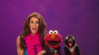 Samantha Harris talks about Reporter with Elmo. Reporter is the word on the street. Sesame Street Episode 4320 Fairy Tale Science Fair season 43