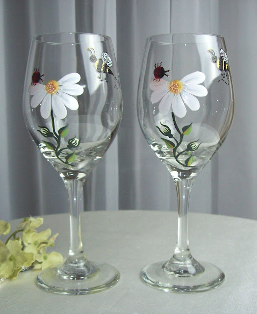 flowers in wine glasses