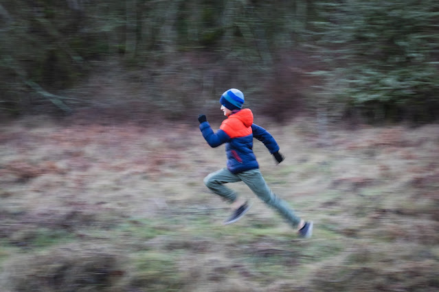 child running on cold day:Photo by Greg Rosenke on Unsplash