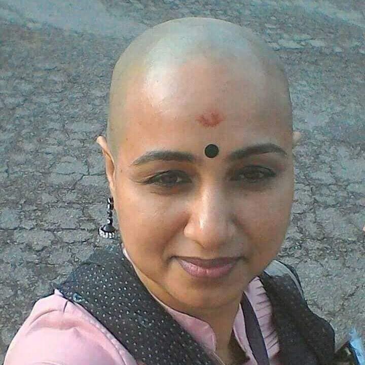 South Indian girl's spiritual head shaving images Village Barber Stories
