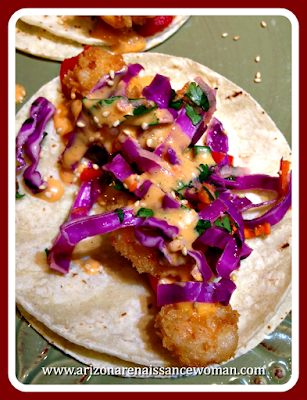 Crispy Shrimp Tacos with Sriracha Sauce, Roasted Red Pepper, and Red Cabbage Apple Slaw