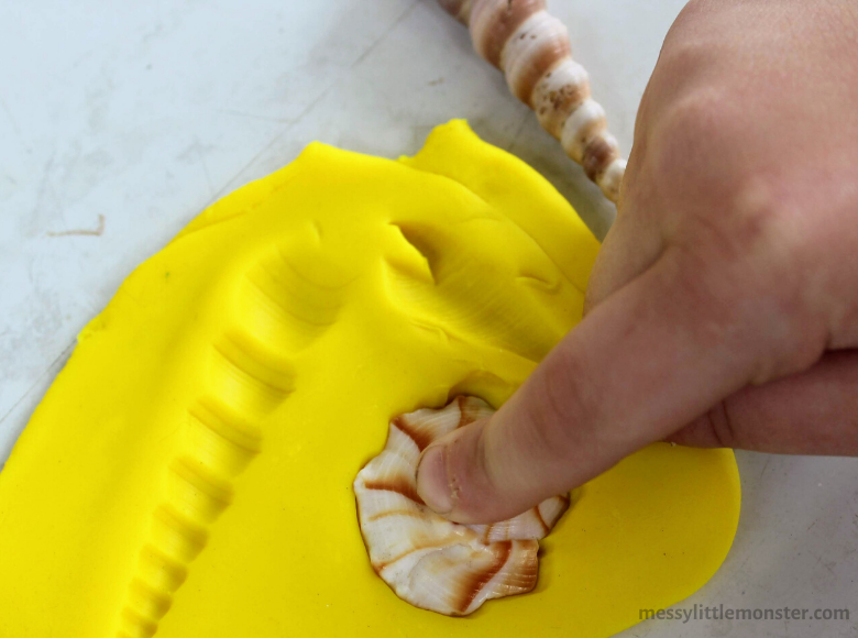 Playdough Seashell Fossils Activity - Messy Little Monster