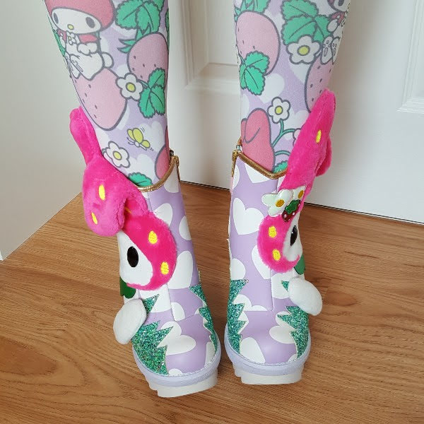 wearing Irregular Choice Sanrio Everyone Loves You boots with Strawberry Melody Tights