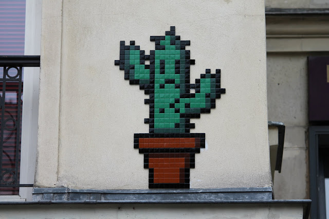 Invader is keeping himself busy this summer with yet another new invasion which just spawned on the streets of Paris.