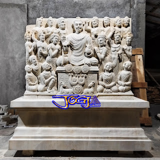 Relief budha terbuat dari batu alam putih jogja (batu paras)